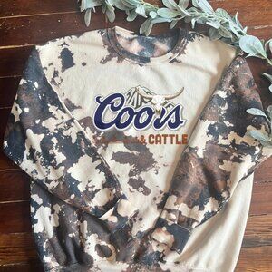 Coors and cattle cowhide crewneck